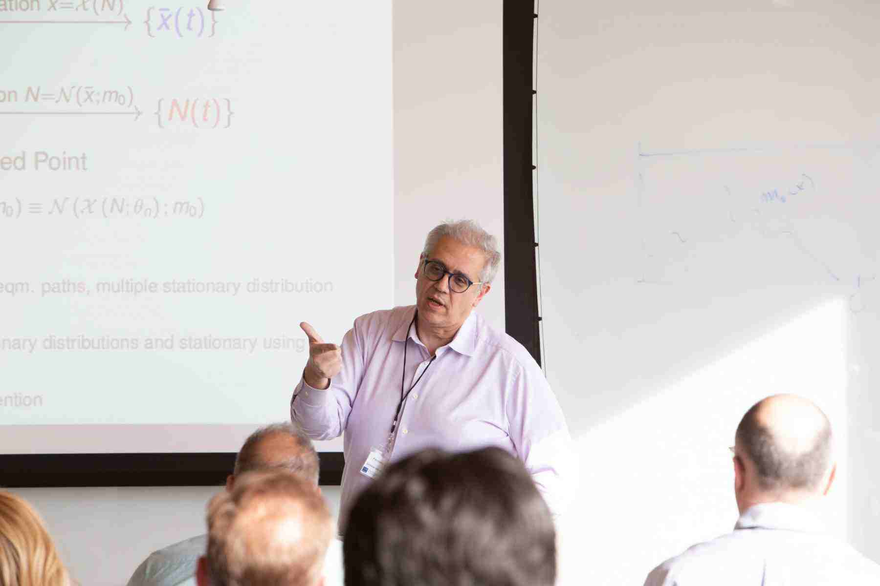 Fernando Alvarez (University of Chicago) presents during a research seminar.